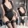 Sexy lace bodysuit for women, featuring deep v-neckline and lace detailing, perfect for a sultry look.
