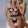 Woman modeling a black lace bra and panty set with embroidered details and push-up cups, featuring strappy design and sheer p...