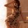 Woman wearing sheer mesh lace cheongsam lingerie with black embroidery and high split, styled as seductive sleepwear outfit.