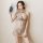Woman modeling sheer lace cheongsam sleepwear with floral embroidery, backless cutout, and open-crotch design.