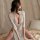 Sexy lace lingerie dress with provocative side slit, bodycon design, perfect for women seeking elegant yet daring sleepwear.