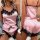Sexy lace lingerie set featuring elegant pink and white stripes with black lace trimmings, perfect for stylish sleepwear and ...