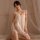 Woman wearing sexy lace mesh backless nightgown, sheer sleep dress with delicate straps, intimate lingerie set for women.