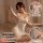 Woman modeling white lace mesh sleepwear set with bow detail bralette and sheer nightgown, plus size design shown in close-up...
