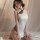 Sexy lace pajama set for women featuring a seductive cheongsam style with openwork design, ties, and high slit.