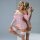 Woman modeling pink lace see-through lingerie set with embroidered details, off-shoulder design, and matching fishnet stockin...