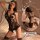 Model wearing a black see-through lace bustier and open-crotch dress. this sexy lingerie set includes sheer mesh details and ...