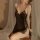 Sexy lace sleep dress featuring deep v-neckline and sheer cutouts, perfect for seductive bedroom lingerie set.