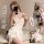 Woman wearing white lace sleep dress with bow tie, sensual ice silk nightwear for romantic evenings.