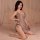 Woman modeling a silver sheer backless halter mini dress from the sexy lace sleepwear set, ideal for nightclub and date night...