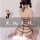Woman wearing black sheer mesh bodysuit with cut-out back and open-crotch design, sitting on bed — sexy lace sleepwear set fo...