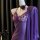 Purple lace sleepwear set with sheer mesh cami, shorts, and matching robe, styled on a mannequin with a rose choker.