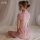 Elegant pink cheongsam sleep dress with lace trim and floral jacquard detail, featuring a split hem design for a stylish look...