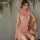 Elegant pink cheongsam sleep dress featuring lace trim, split hem, and floral jacquard detail for a classic yet modern look.