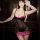 Woman modeling a black and pink lace underwire bodycon skirt set, featuring a sheer mesh design and floral trim.