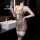 Woman wearing a sexy leopard print lace bodysuit, sheer mesh halter dress for women, seductive sleepwear and lingerie set.