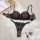 Sexy leopard print lace bra set with push-up cups and matching thong, featuring wild pattern and delicate black lace trim.