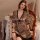 Elegant leopard print sleeprobe for women, featuring lace trim and elegant design, perfect for at-home wear.