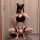 Woman in black sexy lingerie bodysuit with cat ears, posing for mirror selfie. pure & tempting maid costume for role play.