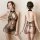 Sexy lingerie sleepwear set featuring sheer peek-a-boo nightgown and cheeky bra top with flirty qipao-inspired design.