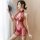 Sexy lingerie sleepwear set featuring sheer peek-a-boo nightgown and cheeky bra top with flirty qipao-inspired design.