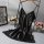 Black lace cami lingerie sleepwear for women, displayed on a hanger with floral decor.