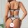 Woman wearing a sexy sheer lingerie set with black straps, featuring a lace bra and matching garter sleepwear.