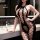 Sexy lingerie set featuring a black sheer mesh bodysuit with open crotch design, backless style, perfect for women seeking bo...