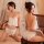Woman modeling white sexy lingerie set with lace-trim camisole and matching shorts, shown front and back views in bedroom set...