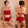 Woman modeling red lace-trimmed lingerie set with halter top and shorts, shown front and back in bedroom setting.