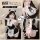 Woman modeling black and white sexy maid costume lingerie set with lace trim, apron, cat ears headband for role play.
