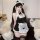 Woman modeling black and white sexy maid costume lingerie set with lace trim, apron, and headpiece for role play.