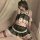 Sexy maid costume set featuring black stockings, ruffled top, and skirt, perfect for seductive and playful adult wear.