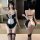 Sexy maid costume for women featuring a black and white design with lace details, adjustable straps, and a seductive look, pe...