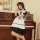 Sexy maid costume set for women featuring a black and white outfit with ruffled details, perfect for roleplay and bedroom pla...