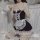 Sexy maid costume for women featuring a black bodice with lace details, white apron, and stockings, perfect for role play and...