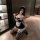 Sexy maid costume for women featuring a black and white dress with lace details, perfect for seductive allure and pure tempta...