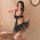 Sexy maid costume for women featuring sheer lingerie set with delicate ruffles and a flowing skirt, perfect for role play out...