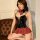Sexy mirror-patent halter-neck lingerie set with plaid mini skirt and bow detail.