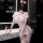 Sexy nurse costume set with lace tie-up bodycon skirt and seductive sleepwear for women, featuring a pink outfit with red cro...