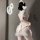Sexy nurse costume set featuring a seductive no-remove lingerie sleepwear with a bow-tie skirt and round neck design.