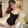 Sexy black one-piece bodysuit with white trim, low-cut design, sheer fabric perfect for nightclub outfits and live streaming.