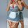 Woman in blue gingham maid bodysuit with lace, red bows, white apron, and garter straps.