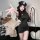 Woman wearing sexy police costume bodysuit with hook-neck, backless design, and mini dress silhouette in pure-yu style.