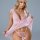 Woman modeling pink polka dot sheer lace babydoll nightgown with adjustable straps and backless design.