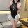 Sexy black pvc bunny costume with mesh panels, front lace-up ties, and white ruffled skirt. latex-inspired erotic bodysuit fo...