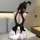Woman wearing black mesh bunny bodysuit with open back, white ruffled skirt, and rabbit ears—sexy pvc lace costume.