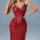 Woman wearing sexy red mesh sleep dress with sheer lace camisole, side slits, and adjustable straps.