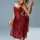 Woman wearing a sexy red mesh sleep dress with sheer lace, side slits, and adjustable straps.