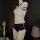 Sexy schoolgirl lingerie set featuring a white top with lace-up design and navy shorts, perfect for a cute miko-style look.